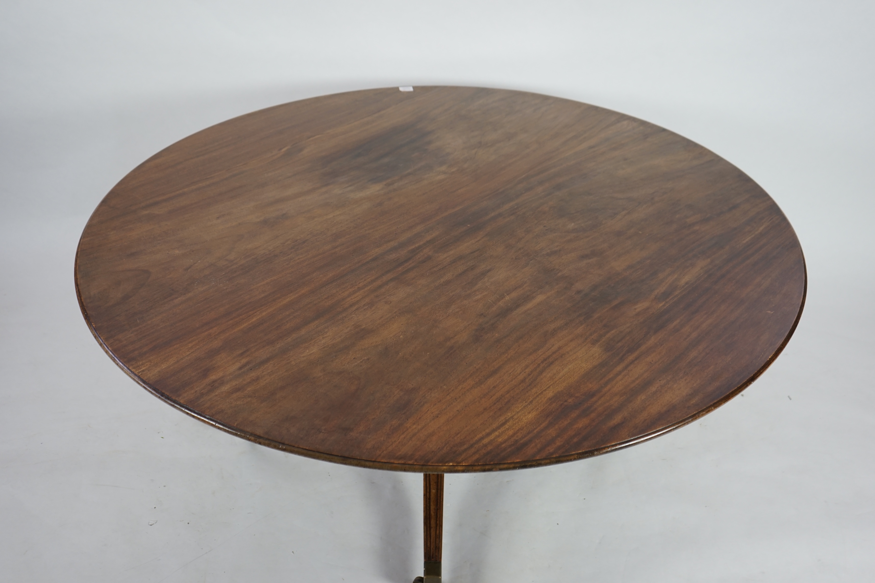 A William Tillman Regency style mahogany circular top breakfast table